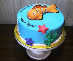 Happy birthday to your adorable little munchkin! Fish Theme Birthday Cake You And Me Cakes Erode Facebook