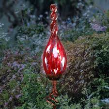 Check out our solar garden stakes selection for the very best in unique or custom, handmade pieces from our garden decoration shops. Exhart Solar Pearlized Hand Blown Glass Twisted Flame Garden Stake With Metal Finial Detail 36 Inch Overstock 27983668