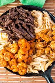 Cajun Shrimp Chicken And Steak Alfredo Pasta Recipe Queenslee