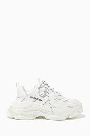 Shop balenciaga exclusive collection online shopping from ounass uae ✓ 2 hour delivery for luxury fashion brands and designers of clothing, dresses, pants, bags, beauty, jewellery and. Shop Balenciaga White Triple S Allover Logo Sneakers For Women Ounass Uae White Balenciaga Sneakers White Balenciaga Balenciaga Shoes