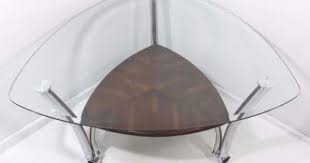 Revamp the look and overall vibe of your interior decoration and bring charm to your space with the aid of modern, elegant glass triangle coffee table at alibaba.com. Contemporary Modern Style Chrome Triangular Glass Top Coffee Table On Casters Glass Top Coffee Table Coffee Table Glass Coffee Table
