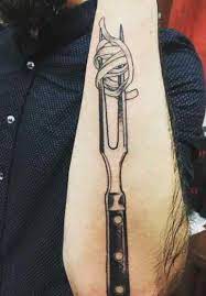 Inside right bicep is a katrina code, a symbol that was spraypainted on houses after hurricane katrina. Andrew Rea S 12 Tattoos Their Meanings Body Art Guru