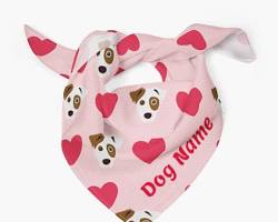 dog wearing a bandana with a heart patternの画像