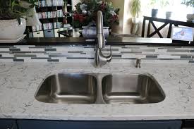 This will make dust, but it is normally controlled with the water used to keep the temperature of the drill bit down. Stainless Steel Kitchen Sink How To Install Countertops Countertop Inspiration Countertops