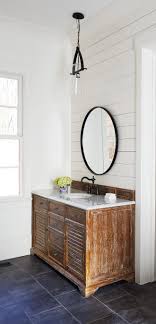 If your mirror is already attached to the wall, you could still create a mirror frame out of crown molding without having to pull said mirror out. Rustic Farmhouse Design Home Bunch Interior Design Ideas Guest Bathroom Decor Crown Molding Bathroom Modern Farmhouse Bathroom