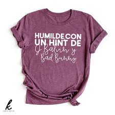 This site is created so people can be able to obtain bad bunny apparel or phone cases. Humilde Con Un Hint De J Balvin Y Bad Bunny Shirt Karla And Co