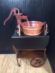 my rustic sink. hand water pump, copper