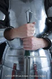 Trevillion Images Historical Man Standing Holding Sword Hand Holding Sword Sword Reference How To Draw Hands The 32 sword forms. hold the sword in the left hand, with the sword along the back side of the left arm. historical man standing holding sword