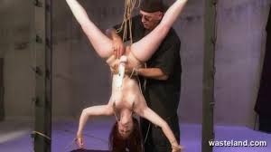 Tied up upside down and her pussy penatrated 