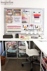 Stick an easel or small table in the middle of your space, so you can have easy access to the items all around you. 50 Craft Rooms A Girl And A Glue Gun