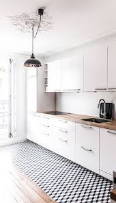 See these ideas on how to the sleek island, glossy wooden floors, and white cabinets make the space equal parts homey and chic. White Kitchen Cabinets The Ultimate Design Guide