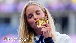 Great Britain's Keely Hodgkinson sheds tears while receiving her first  Olympic gold