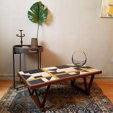 The frame is mortise and tenon. Geometric Tiled Coffee Table