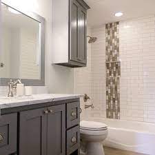 Bathrooms shown here are designed in white, blue, and black colors. Beautiful Bathrooms With Subway Tile