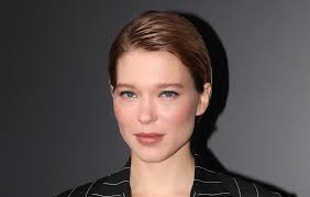This léa seydoux photo contains well dressed person, suit, pants suit, and pantsuit. No Time To Die Star Lea Seydoux Tests Positive For Covid 19