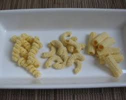 Knit definition, to make (a garment, fabric, etc.) by interlocking loops of one or more yarns either by hand with knitting needles or by machine. Spaghetti Party By Copaceticcrocheter On Etsy Crochet Food Crochet Cake Pasta Party