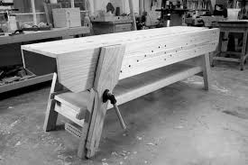 This kitchen island features a towel rack, spice rack, one spacious drawer and enclosed cabinet space with one shelf. Rules For Workbenches Popular Woodworking Magazine