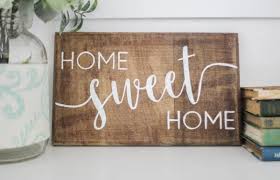 How to paint letters and graphics on wood signs, furniture and flat surfaces without using a stencil. How To Stencil On Wood With Beautiful Results Every Time Lovely Etc