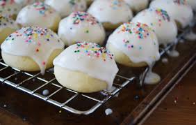 Dip cooled cookies in icing, coating completely; Auntie Mella S Italian Soft Anise Cookies The Apron Archives