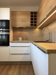 Simple hanging globe lights look elegant but allow for more drama in other areas, like custom tile on the vent hood and wood finishes for the cabinets. Pin On My Kitchen