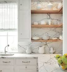 Pure white makes your kitchen look elegant and if the lighting. 25 Timeless And Chic Marble Kitchen Backsplashes Shelterness
