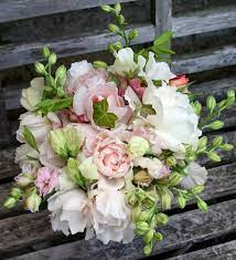 An english garden party in an old cotswold country house with summer wedding flowers. Choose Seasonal Blooms For Your Summer Wedding The Natural Wedding Company