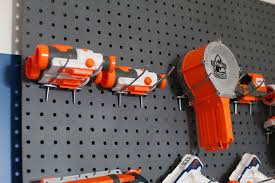 No more nerf darts and guns lying everywhere. Nerf Wall Pegboard Storage Sugar Bee Crafts