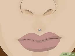 The silver nose ring further adds up even more detail. How To Get A Medusa Piercing With Pictures Wikihow