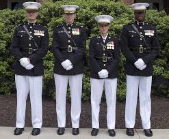 Marines Demonstrate The Current Male And Female Dress Blue Uniforms As Well As One Prototype Fo Marine Dress Blues Uniform Female Marines Marine Corps Uniforms