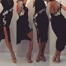 This Beautiful Tango Dress Fashioned Out Of Black Elastic Jersey And Beautiful White Ornament Flowers Is Going Argentine Tango Dress Tango Fashion Tango Dress