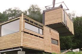 These Modular Pod Homes Balance On Stilts So Plants Can Grow Underneath House On Stilts Modular Homes Rammed Earth Homes