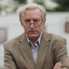 Effingham parish councillor James Nicholls appears in court for allegedly  threatening travellers with metal pole