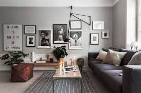 A Scandinavian Home With Grey Walls An Industrial Touch Living Room Scandinavian Living Room Designs Scandinavian Home
