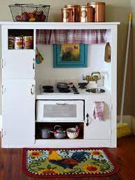 Corissa and kris needed a place to dine, and since they have no space for a table in their kitchen, they decided to turn a spare bedroom into a dining room. How To Turn An Old Entertainment Center Into A Play Kitchen How Tos Diy