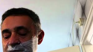 HALF SHAVING SCENE AT MORNINR