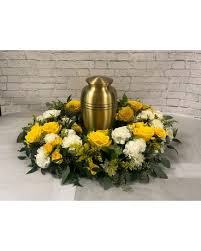 In fact, many of the same elements of a funeral service can be used in a cremation ceremony, like music nonetheless, you can always send floral arrangements and also donate to the family's preferred charity.at a cremation service, the family. Yellow And White Cremation Wreath Jennie S Flowers