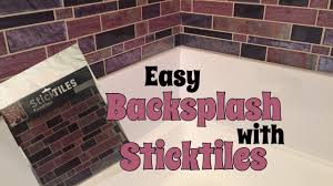 Once the peel and stick tile wall is all laid out, you can decide how you want to trim it out. Diy Peel And Stick Backsplash Bathroom Enhancement Youtube