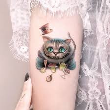Edit Paints Tattoo On Instagram Cheshire Cat Aliceinwonderland Thank You Kim In 2020 Wonderland Tattoo Cat Tattoo Disney Tattoos