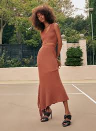 This pleated skirt is made from stretchy knit fabric and is giving us a major clueless moment. Costello Knit Skirt