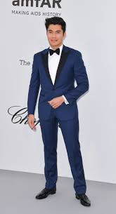 A s a child growing up in an international expat community in dungun, malaysia, henry golding used to tell his mum off whenever she tried to teach him malay. Henry Golding Continues To Own The Tuxedo Look Esquire Middle East