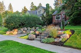 Village on hillside, castle on top. Canon Hill Driveway Spokane Landscaping Pacific Garden Design