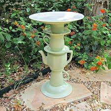 | create a memorable bird bath using all those mismatched teapots and tea sets lying at the back of your cabinet. 10 Easy Diy Bird Bath Projects