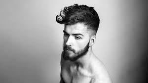 While hair with natural curl can be unruly, that's not the case all the time. Picture Of Textured Waves With Low Fade Gives You A Youghful Feel And The Waves Are Wild