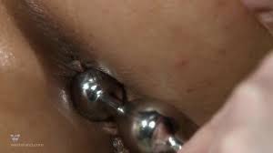 Beauty with big round ass deserves some metal anal balls