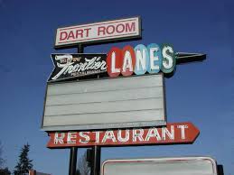 Folks knocking back shots as they attempt to shoot straight in a game of darts. The Old Frontier Lanes Bowling Alley On Center Street Demolished And Now The Site Of A Jack In A Box And A Bank Yaawwwn Tacoma Washington Bowling Tacoma
