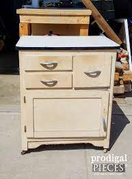 I just purchased an enamel top table with spring loaded extensions on each side. Enamel Cabinet Makeover Cottage Style Prodigal Pieces