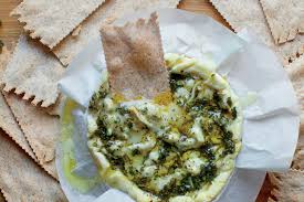 Camembert is a versatile cheese in the kitchen. Herb And Garlic Baked Camembert Recipe Recipe Epicurious