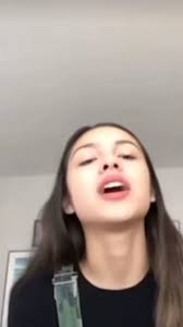olivia rodrigo singing along to taylor swift