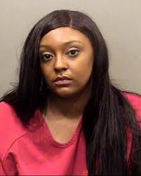 Woman accused of burglary, theft at Normal apartment