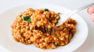 Add the onion, garlic, ginger and tomato paste to the skillet, stir and cook for 3 to 5 minutes or until the onion is soft and translucent. Healthy One Pan Couscous With Garlic Tomato And Basil Homemade Mastery